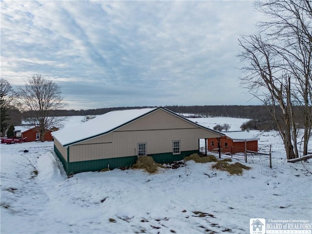 view of snow covered property