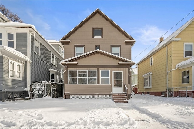 view of snow covered house