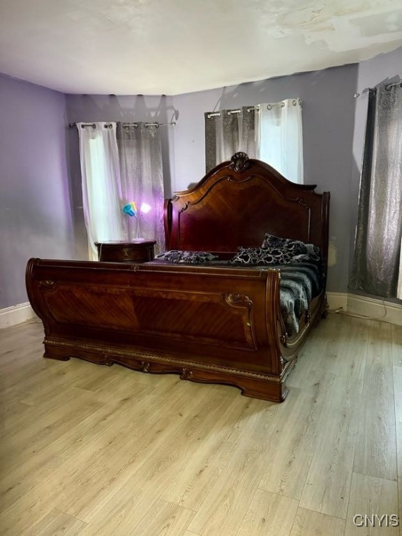 bedroom featuring light wood-type flooring