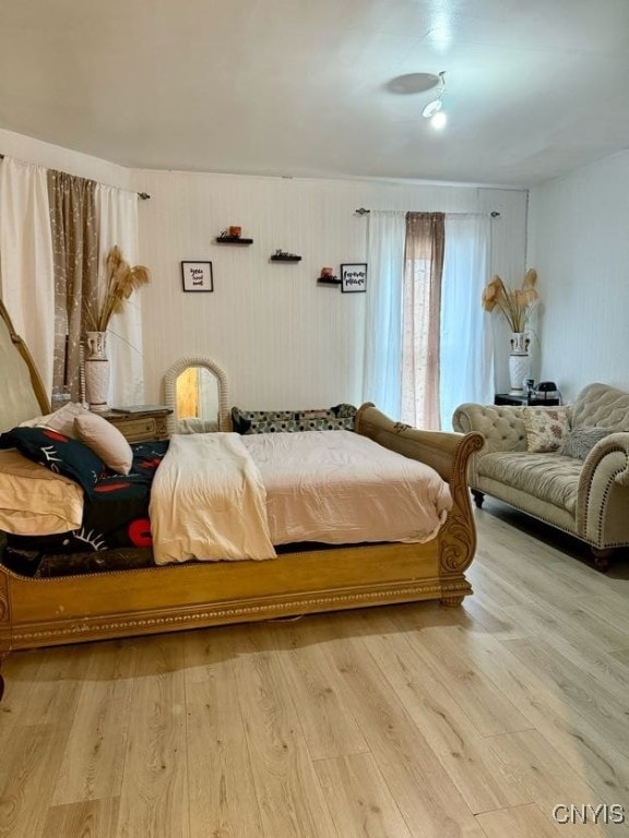 bedroom featuring light hardwood / wood-style floors