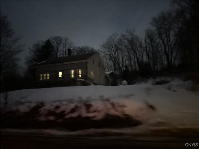 view of property exterior at twilight