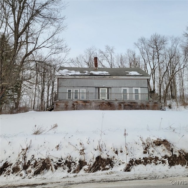 view of front of house with a chimney