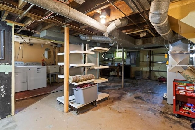 basement featuring separate washer and dryer