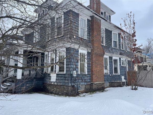 view of snow covered property