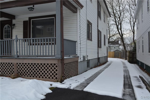 view of snow covered property