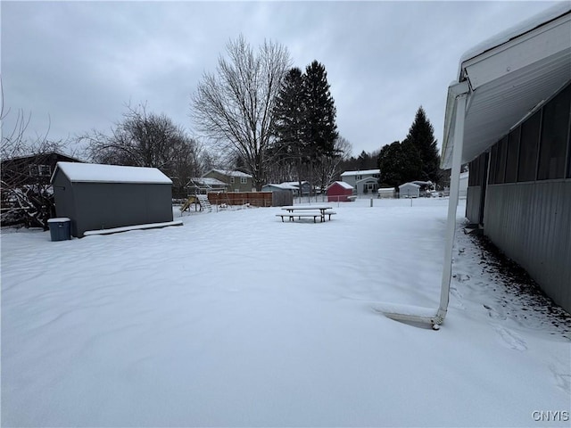 view of yard covered in snow