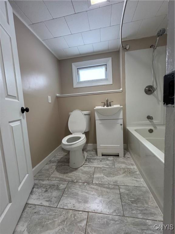 full bathroom featuring bathing tub / shower combination, vanity, and toilet