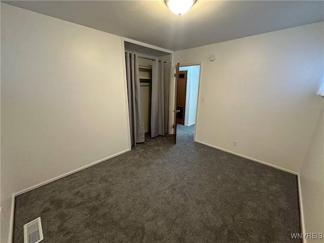 view of carpeted spare room