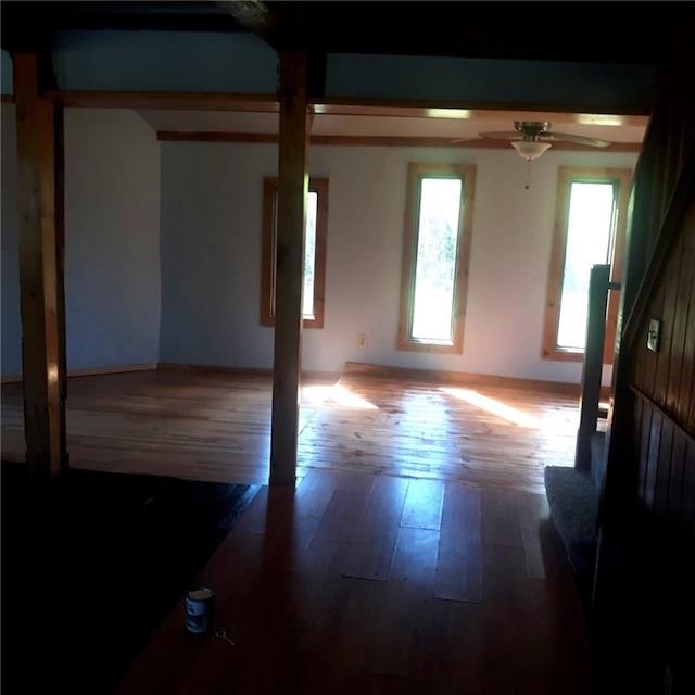 unfurnished room featuring ceiling fan and wood-type flooring