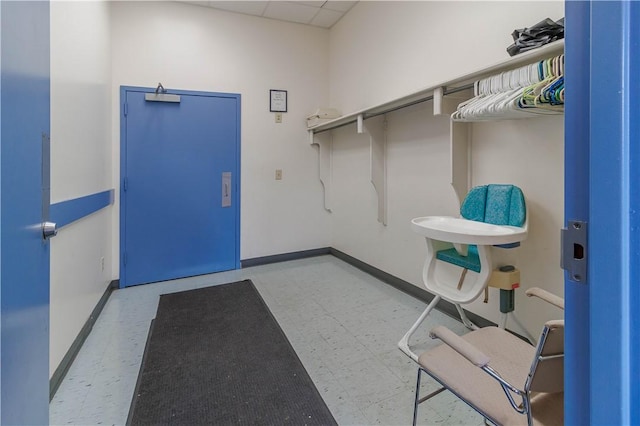 248 W Ave, Clarkson, NY 14420 - miscellaneous room featuring tile patterned floors and a paneled ceiling