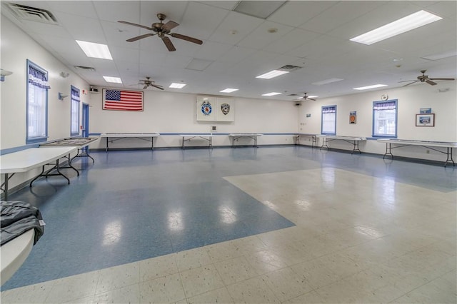 248 W Ave, Clarkson, NY 14420 - misc room featuring a ceiling fan, tile patterned floors, and a paneled ceiling
