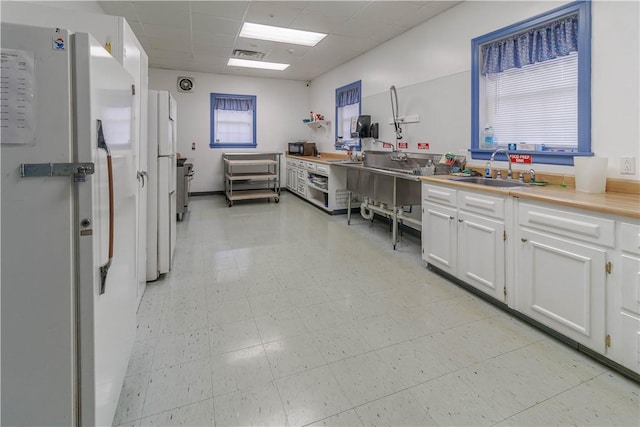 248 W Ave, Clarkson, NY 14420 - bathroom with a drop ceiling and tile patterned floors