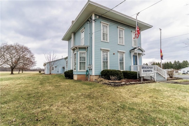 248 W Ave, Clarkson, NY 14420 - view of side of home with a lawn