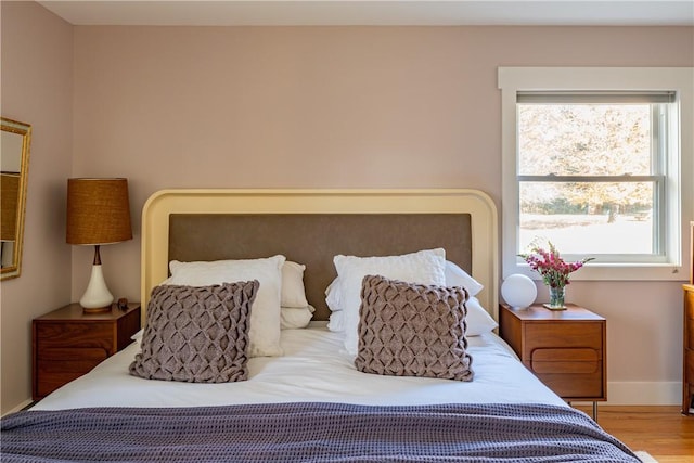 bedroom featuring hardwood / wood-style floors