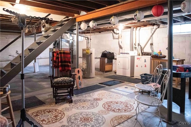below grade area featuring water heater, separate washer and dryer, and stairs