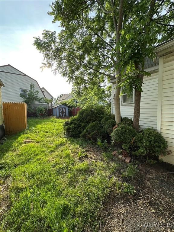 580 S Ogden St, Buffalo, NY 14206 - view of yard with a storage unit