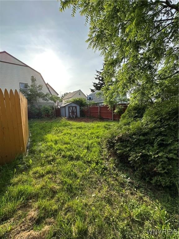580 S Ogden St, Buffalo, NY 14206 - fenced backyard featuring a shed