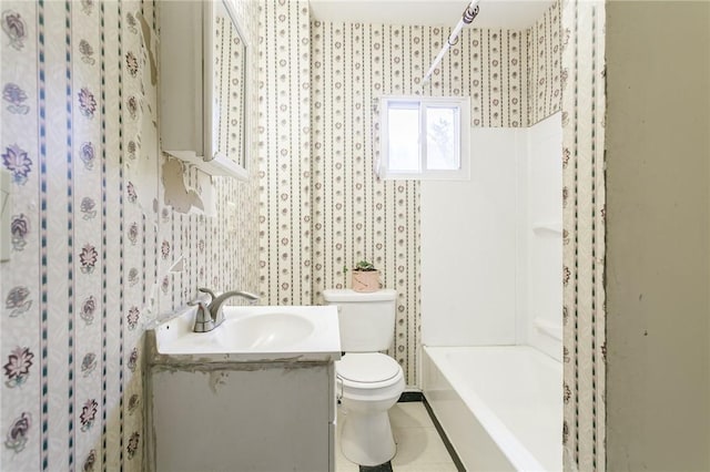 full bathroom with tile patterned floors, vanity, shower / bathtub combination, and toilet