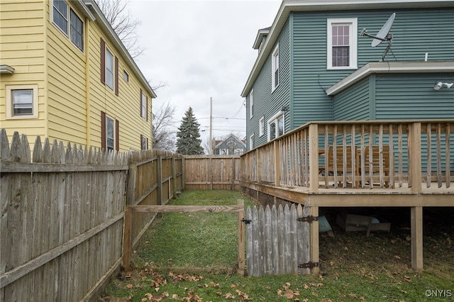 view of yard featuring a wooden deck