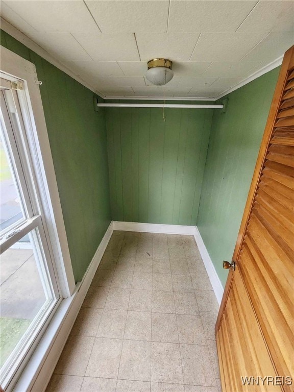 spare room with crown molding