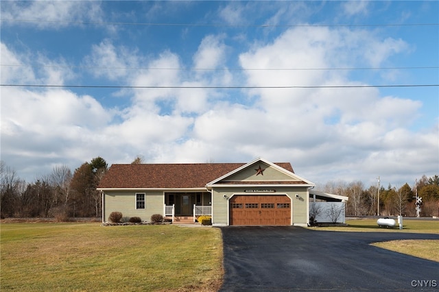 single story home featuring a front yard, a garage, a carport, and covered porch