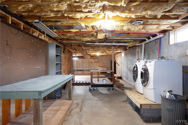 basement featuring separate washer and dryer