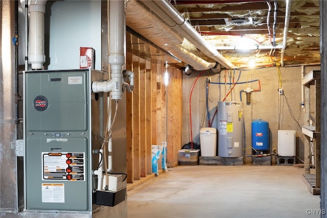 utility room featuring water heater