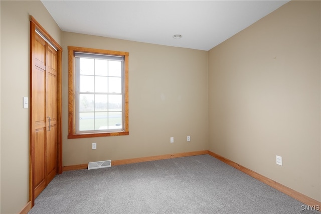 view of carpeted spare room