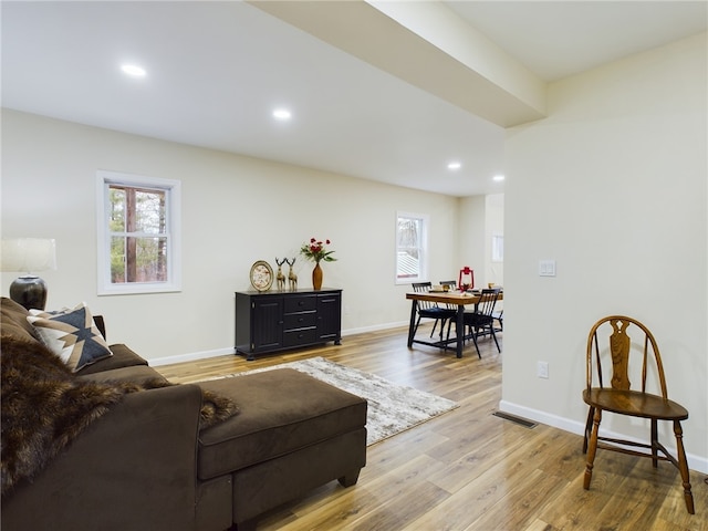 living room with light hardwood / wood-style floors