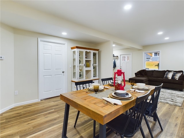 dining room with light wood-type flooring