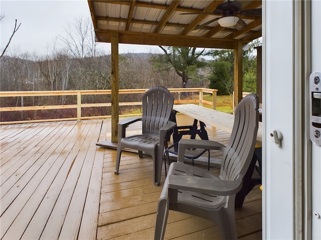 wooden deck with ceiling fan