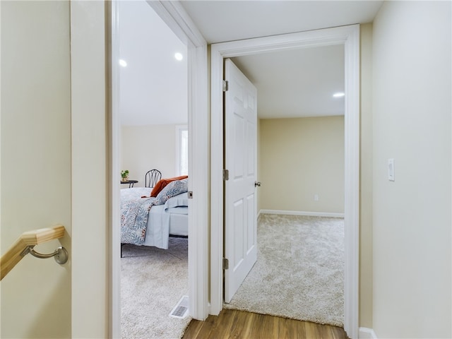 corridor featuring light wood-type flooring