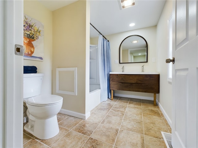 full bathroom with vanity, toilet, and shower / tub combo