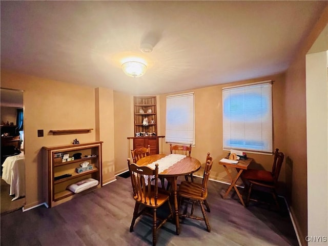 dining room featuring dark hardwood / wood-style floors