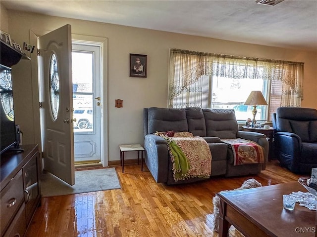 living room featuring light wood-type flooring