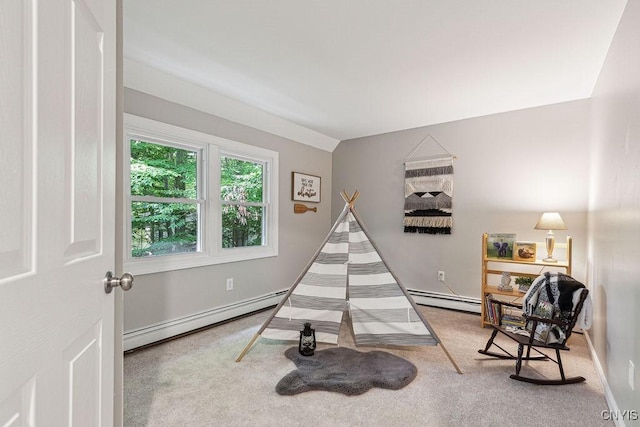 game room featuring baseboard heating and carpet