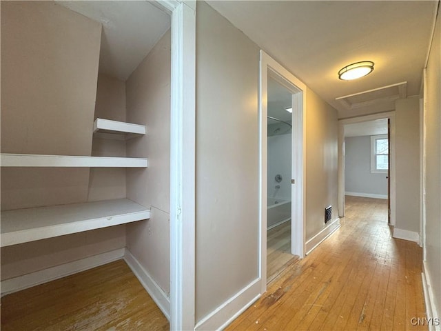 hall featuring light hardwood / wood-style flooring