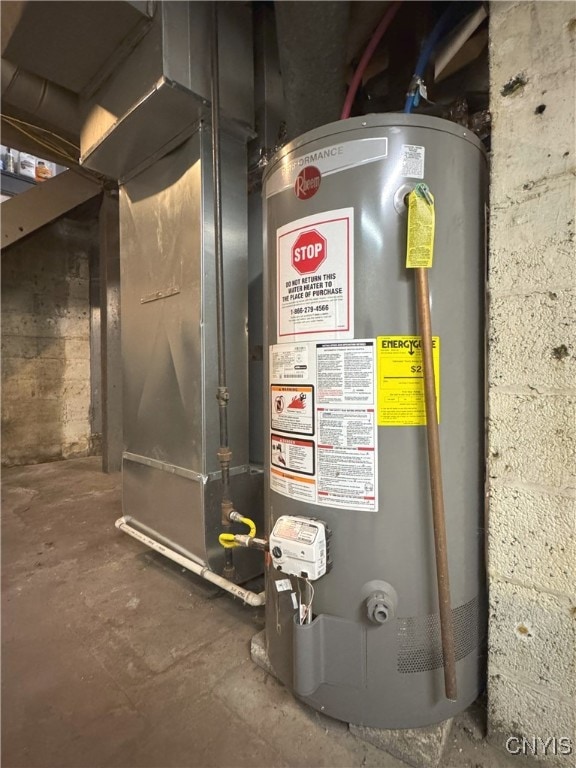 utility room featuring gas water heater