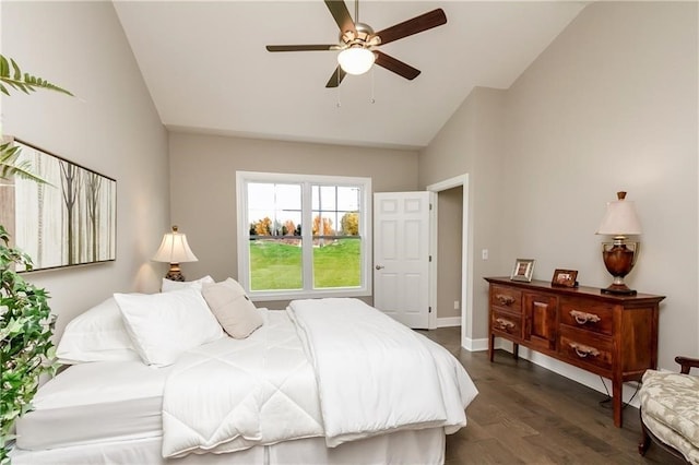 bedroom featuring dark wood-type flooring, ceiling fan, and lofted ceiling