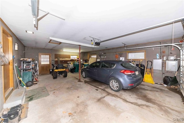 garage featuring a garage door opener