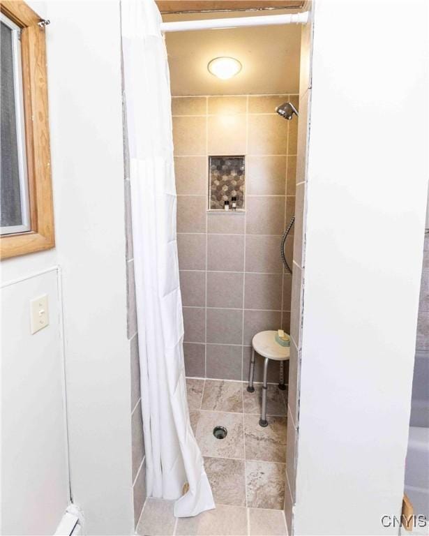 bathroom featuring curtained shower