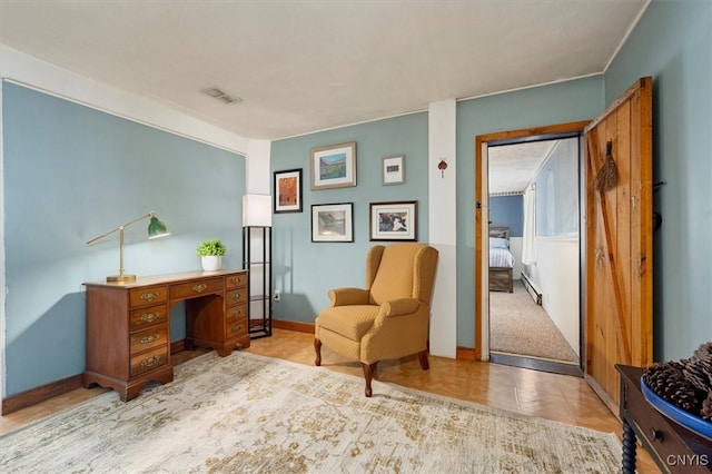 sitting room featuring light tile patterned floors