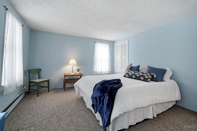 bedroom with carpet flooring, a textured ceiling, and a baseboard radiator