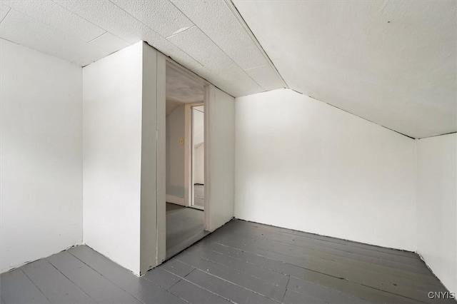 bonus room with vaulted ceiling