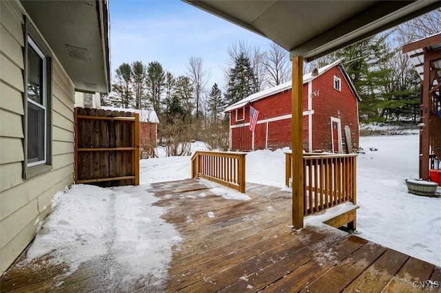 view of snow covered deck