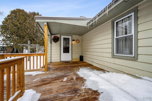 view of snow covered deck