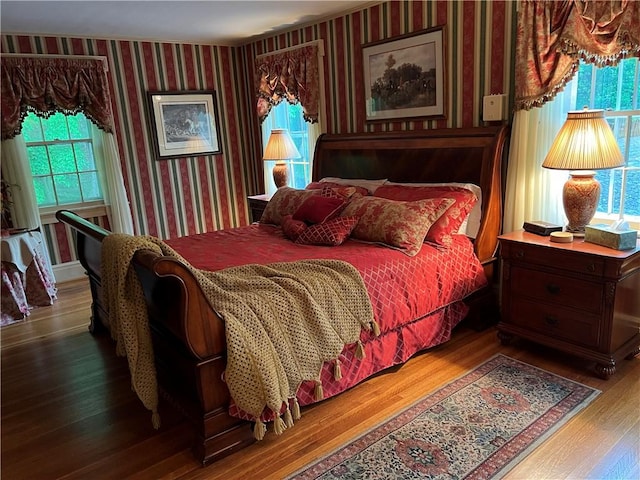 1470 State Route 19, Middlebury, NY 14591 - bedroom with wallpapered walls, wood finished floors, and multiple windows