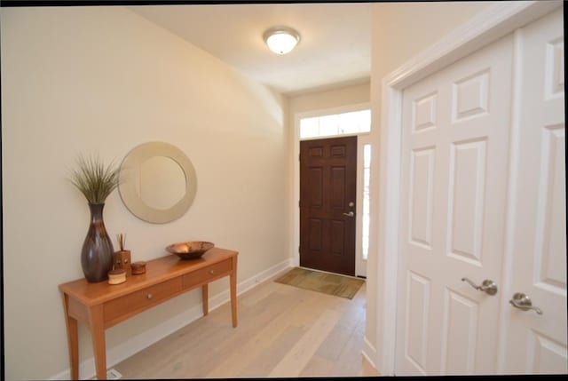 foyer featuring light hardwood / wood-style flooring