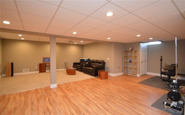 workout room with hardwood / wood-style floors