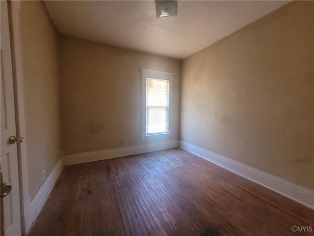 empty room featuring hardwood / wood-style floors